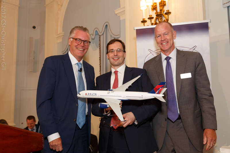Ed Bastian, Scott Higgins and winner of Delta model airplane